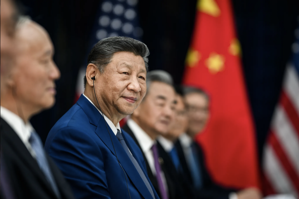 Xi